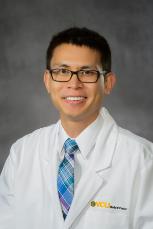 Bryant Tran white coat